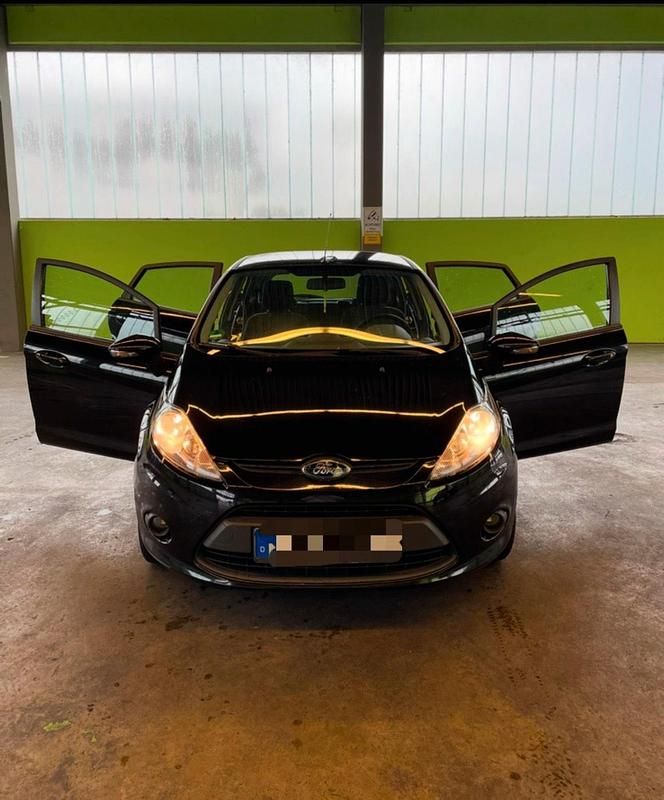 Schwarz Gebraucht 2009 Ford Fiesta Limousine | 3.750 € (Fairer Preis) - Bild 1/4