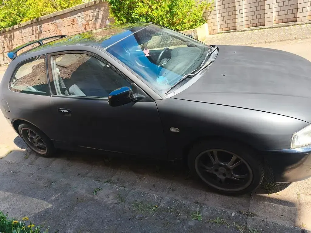 Second-hand Mitsubishi Colt 82 CP (60 kW) 2003 Negru Hatchback