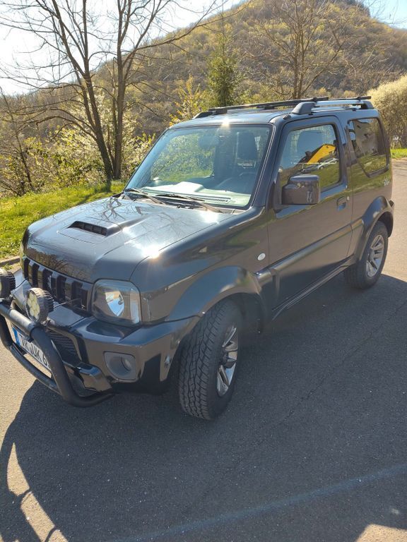 Schwarz Gebraucht 2015 Suzuki Jimny Style SUV | 13.500 € (Superpreis) - Bild 1/4
