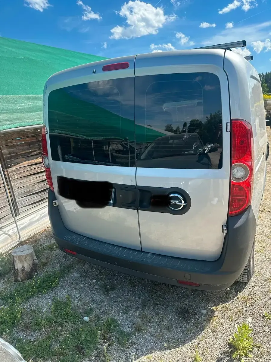 Używany Opel Combo 90 KM (66 kW) 2014 Srebrny Minivan