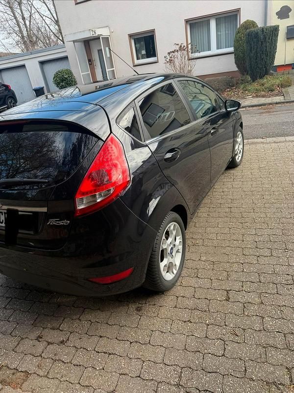 Gebraucht Ford Fiesta 75 PS (55 kW) 2011 Schwarz Kleinwagen