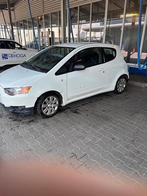 Weiß Gebraucht 2013 Mitsubishi Colt Kleinwagen | 399 € - Bild 1/4