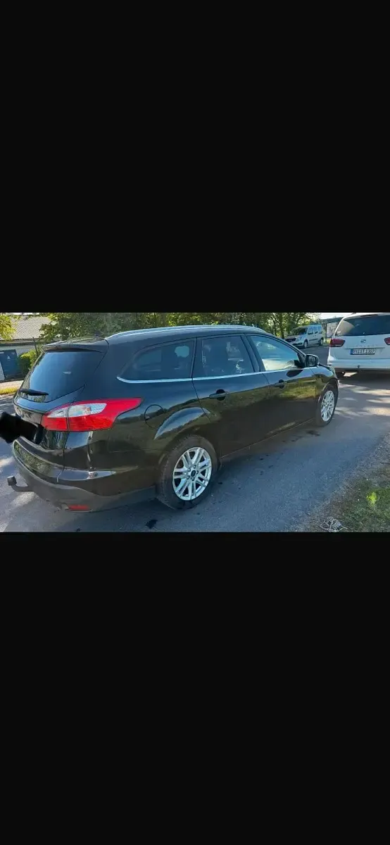 Używany Ford Focus Titanium 140 KM (102 kW) 2014 Czarny Kombi