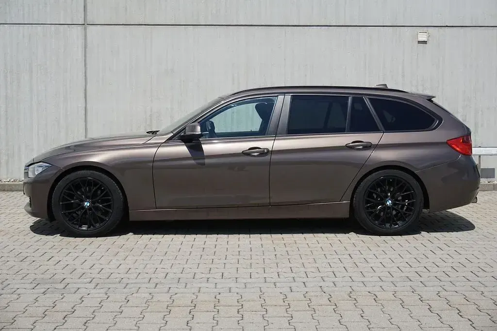 Gebraucht BMW 320 Performance 184 PS (135 kW) 2013 Sparkling bronze metallic Kombi