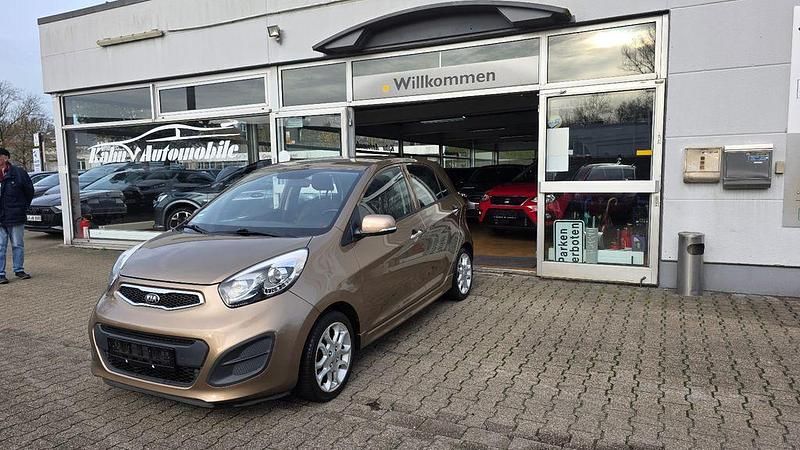 Braun Gebraucht 2013 Kia Picanto FIFA World Cup Edition Kleinwagen | 6.490 € (Fairer Preis) - Bild 1/4