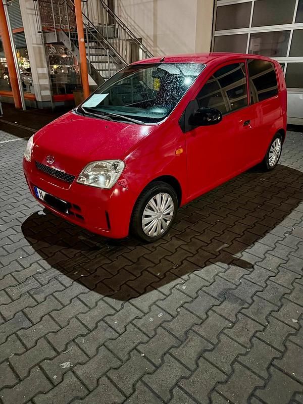 Gebraucht Daihatsu Cuore 58 PS (42 kW) 2005 Rot Kleinwagen