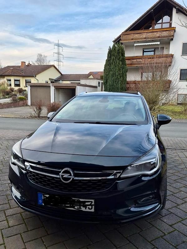 Gebraucht Opel Astra 110 PS (80 kW) 2016 Grün Kombi