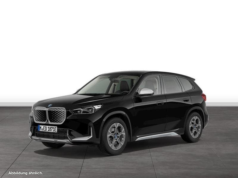 Schwarz Gebraucht 2024 BMW iX1 Luxury Line SUV | 44.994 € (Fairer Preis) - Bild 1/4