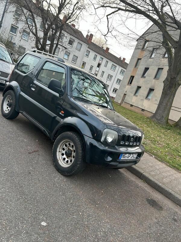 Schwarz Gebraucht 2001 Suzuki Jimny SUV | 2.700 € (Fairer Preis) - Bild 1/4