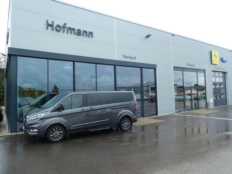 Grau (magnetic) Gebraucht 2022 Ford Tourneo Custom Titanium X Van / Kleinbus | 30.950 € (Guter Preis) - Bild 1/4