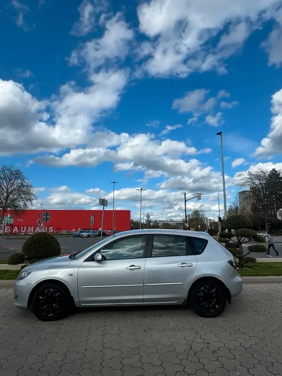 Używany Mazda 3 109 KM (80 kW) 2006 Szary Sedan/Limuzyna