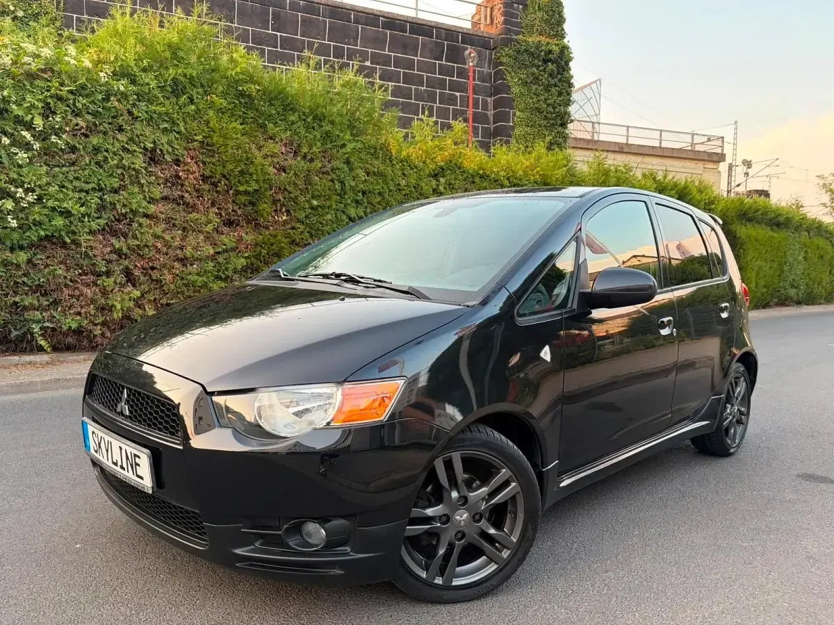 Gebraucht Mitsubishi Colt 75 PS (55 kW) 2010 Schwarz Kleinwagen
