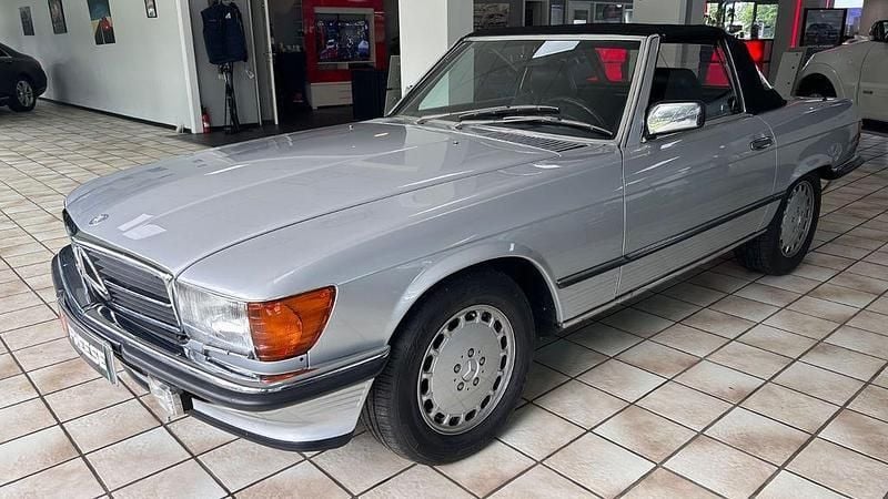 Silber Gebraucht 1986 Mercedes SL420 Cabrio | 44.800 € - Bild 1/4