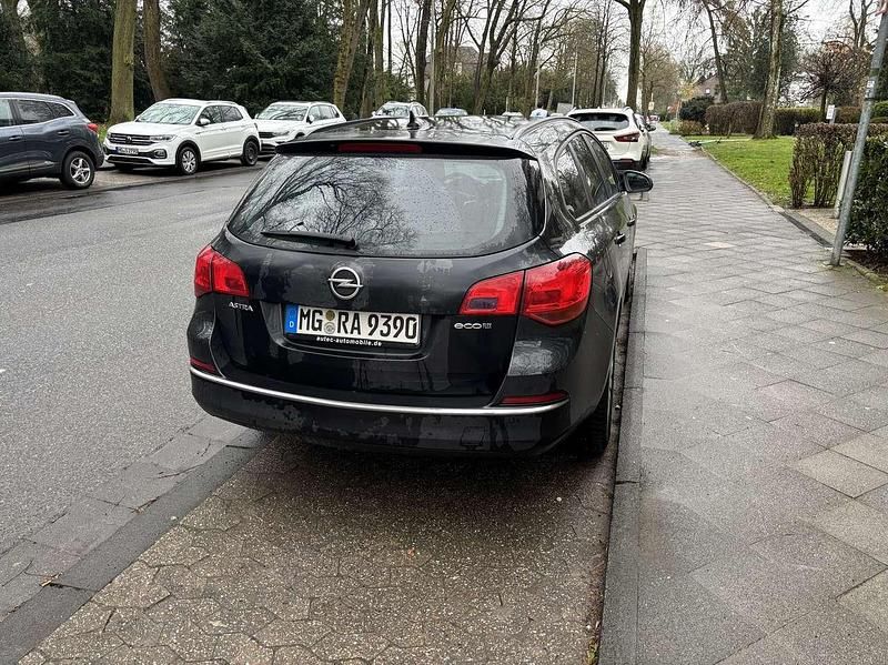 Gebraucht Opel Astra Edition 110 PS (80 kW) 2014 Schwarz Kombi