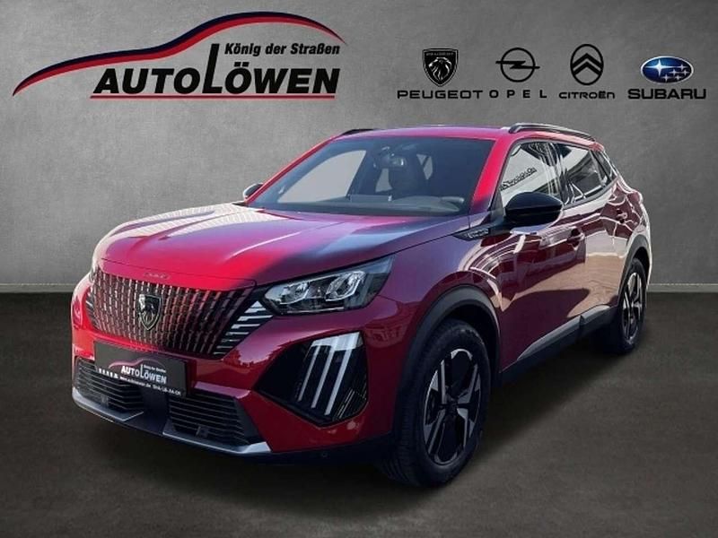 Met. elixir rot (rot) Gebraucht 2024 Peugeot e-2008 Allure SUV | 26.370 € (Superpreis) - Bild 1/4
