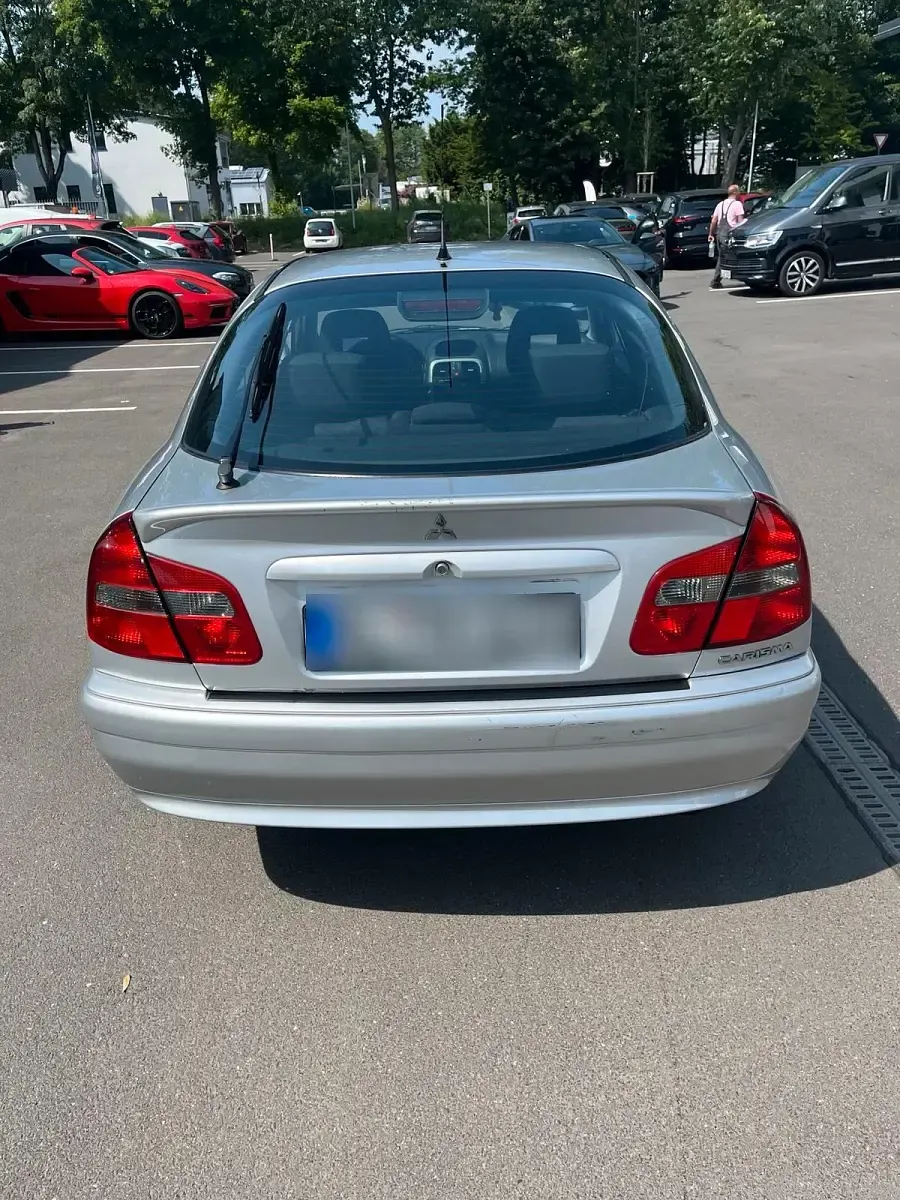 Gebraucht Mitsubishi Carisma 105 PS (77 kW) 2004 Grau Limousine
