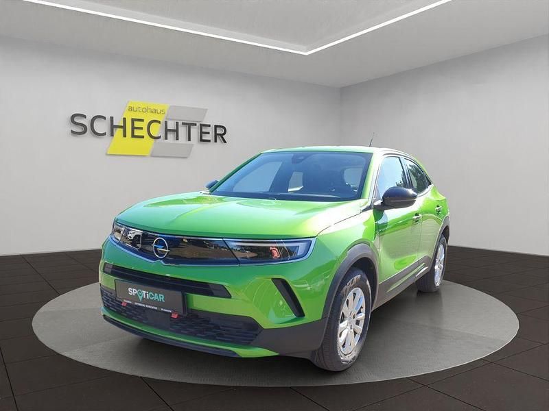 Grün Gebraucht 2023 Opel Mokka Enjoy SUV | 17.990 € (Fairer Preis) - Bild 1/4
