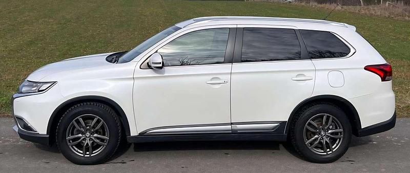 Gebraucht Mitsubishi Outlander Top 150 PS (110 kW) 2016 Perlmuttweiß (metallic) SUV