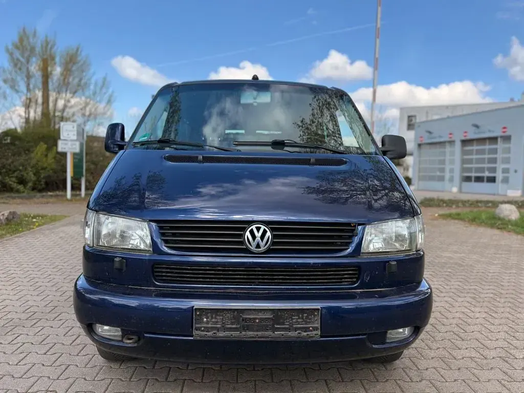 Second-hand VW Caravelle 151 CP (111 kW) 2003 Albastru Van