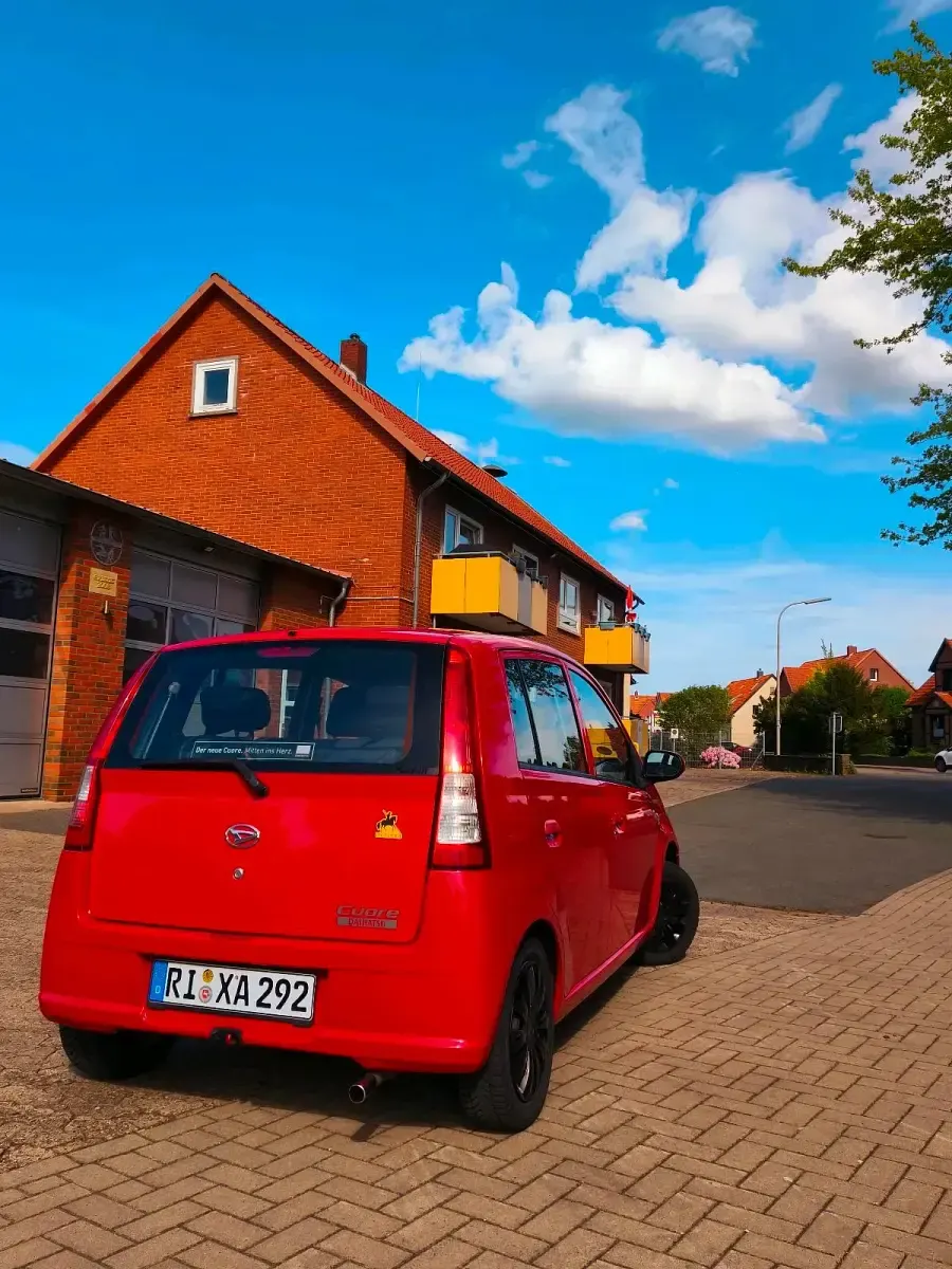 Gebraucht Daihatsu Cuore 58 PS (42 kW) 2006 Rot Kleinwagen