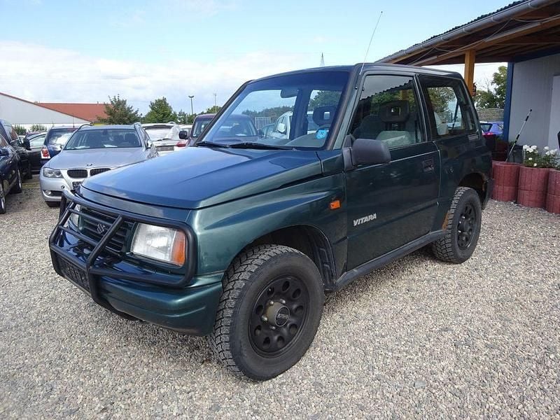 Grün Gebraucht 2001 Suzuki Vitara SUV | 2.200 € - Bild 1/4