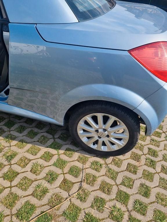 Gebraucht Opel Tigra Cosmo 90 PS (66 kW) 2005 Schwarz Cabrio