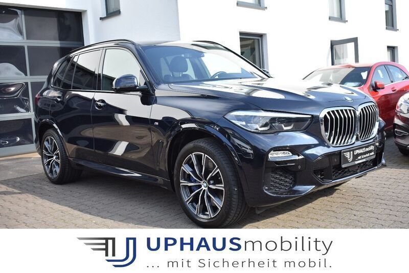 Schwarz (carbonschwarz metallic) Gebraucht 2019 BMW X5 M Sport SUV | 44.940 € (Fairer Preis) - Bild 1/4
