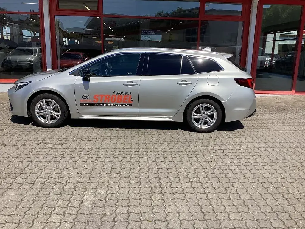 Gebraucht Toyota Corolla 196 PS (144 kW) 2025 Cosmicsilber metallic Kombi