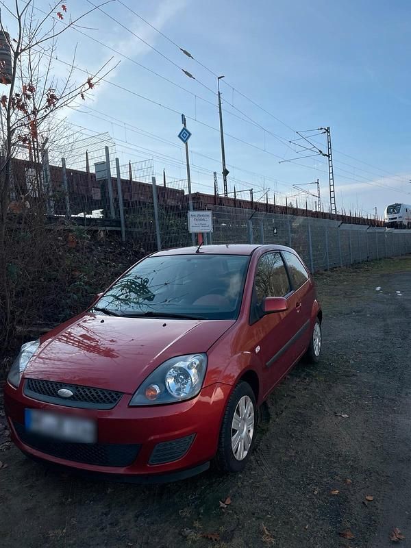 Orange Gebraucht 2006 Ford Fiesta Limousine | 1.000 € (Guter Preis) - Bild 1/4