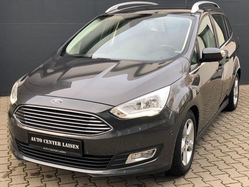 Grau Gebraucht 2016 Ford Grand C-Max Titanium Van / Kleinbus | 10.499 € (Fairer Preis) - Bild 1/3