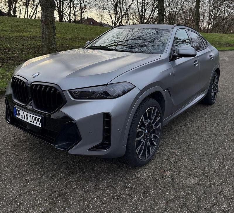 Grau Gebraucht 2024 BMW X6 M Sport SUV | 91.100 € (Teuer) - Bild 1/4