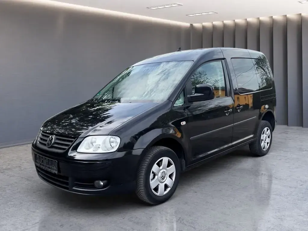 Gebraucht VW Caddy Team 105 PS (77 kW) 2010 Schwarz Van / Kleinbus