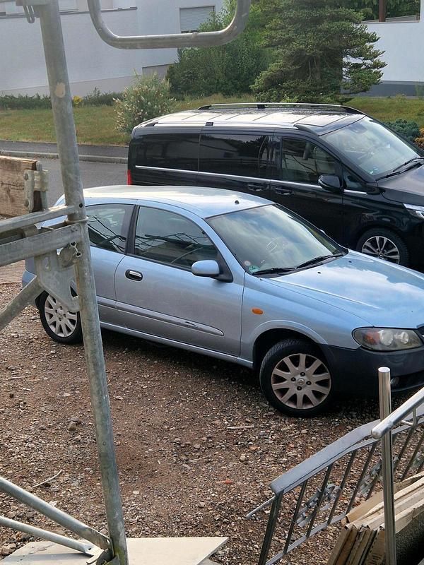 Grau Gebraucht 2004 Nissan Almera Kleinwagen | 1.666 € - Bild 1/4