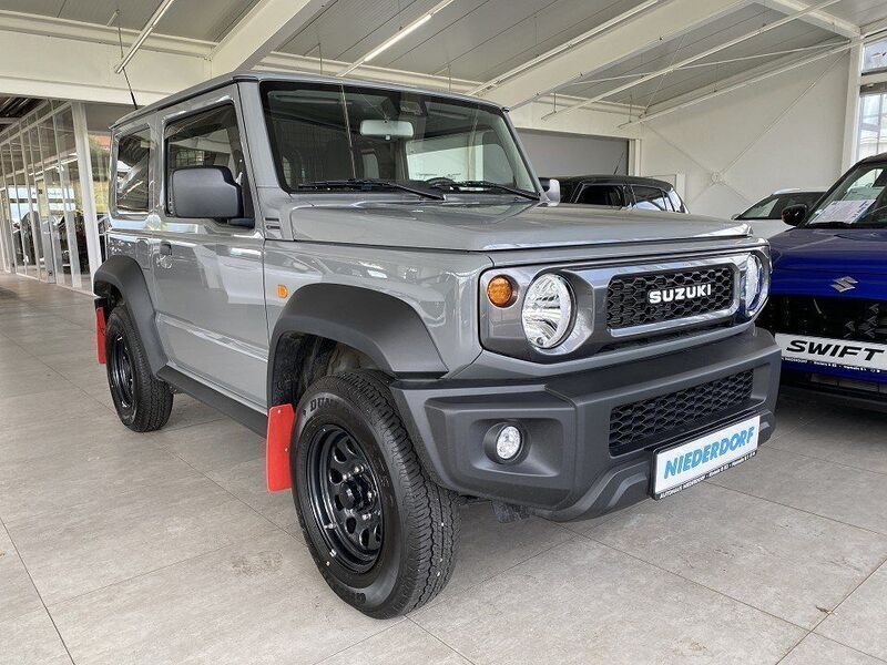 Grau Gebraucht 2023 Suzuki Jimny Comfort SUV | 31.800 € (Teuer) - Bild 1/4