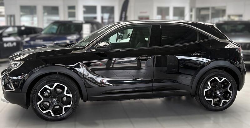 Gebraucht Opel Mokka-e Ultimate 100 kW (136 PS) 2021 Diamant schwarz/karbon schwarz SUV
