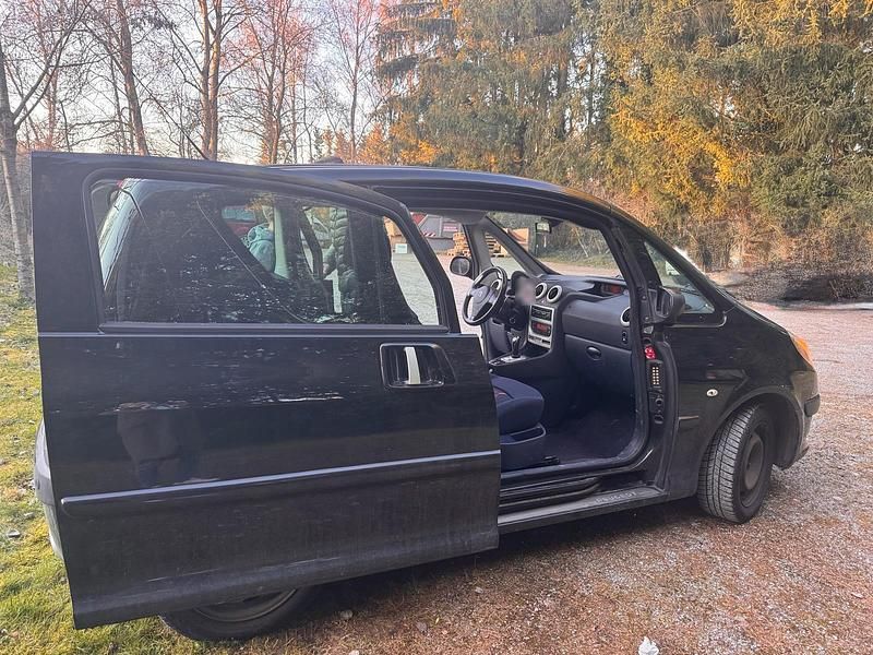 Gebraucht Peugeot 1007 108 PS (79 kW) 2005 Schwarz Van / Kleinbus