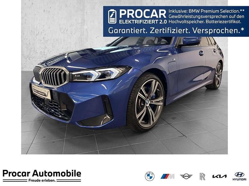 M portimao blau metallic Gebraucht 2024 BMW 330e M Sport Kombi | 45.390 € (Fairer Preis) - Bild 1/3