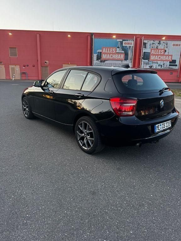 Second-hand BMW 114 102 CP (75 kW) 2014 Negru Hatchback
