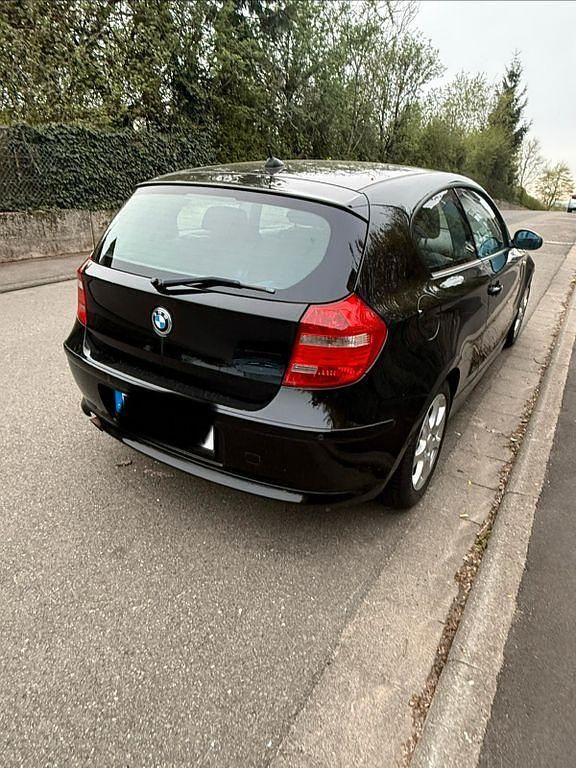 Second-hand BMW 118 143 CP (105 kW) 2007 Negru Hatchback