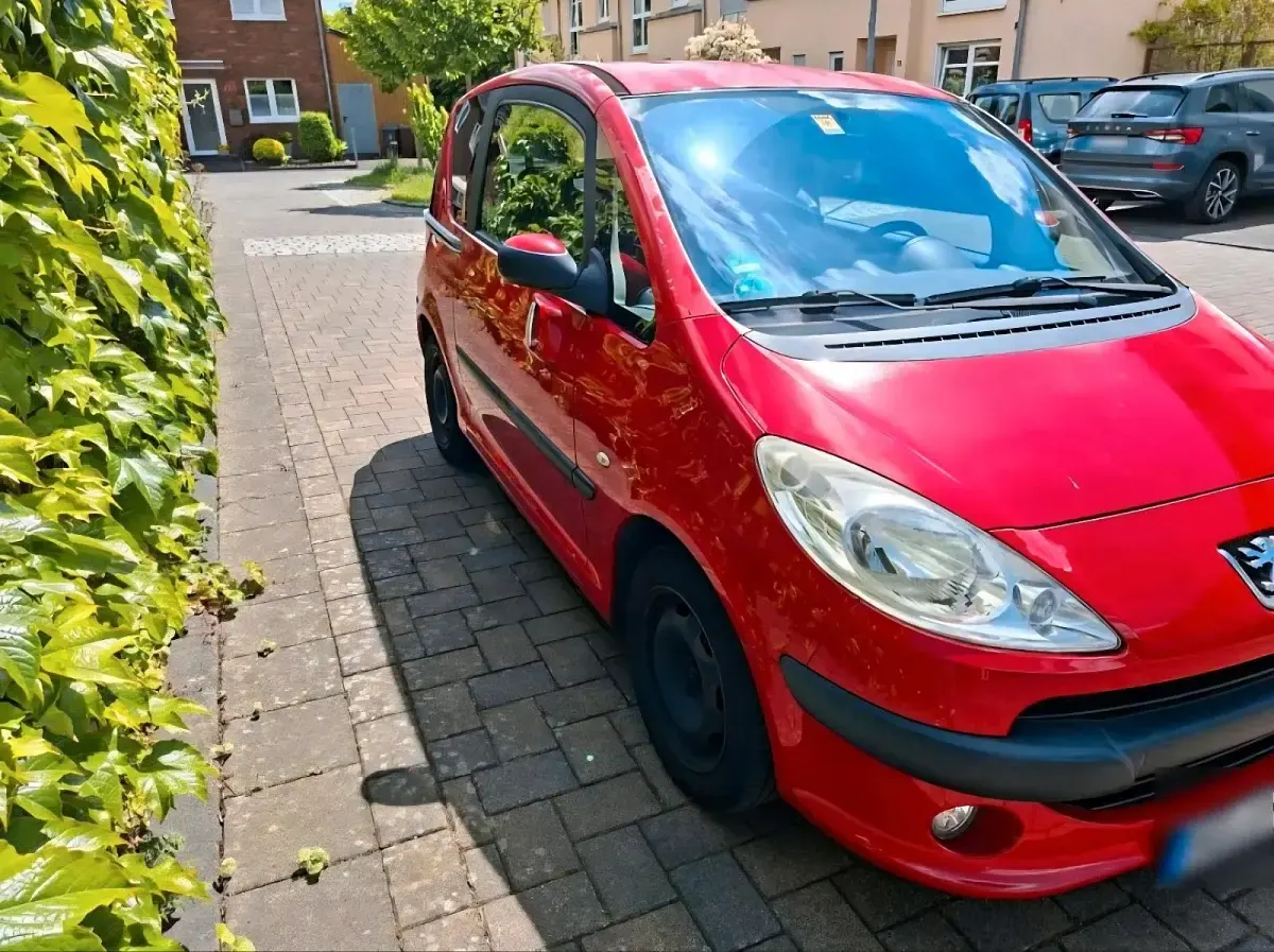 Gebraucht Peugeot 1007 73 PS (53 kW) 2006 Rot Van / Kleinbus