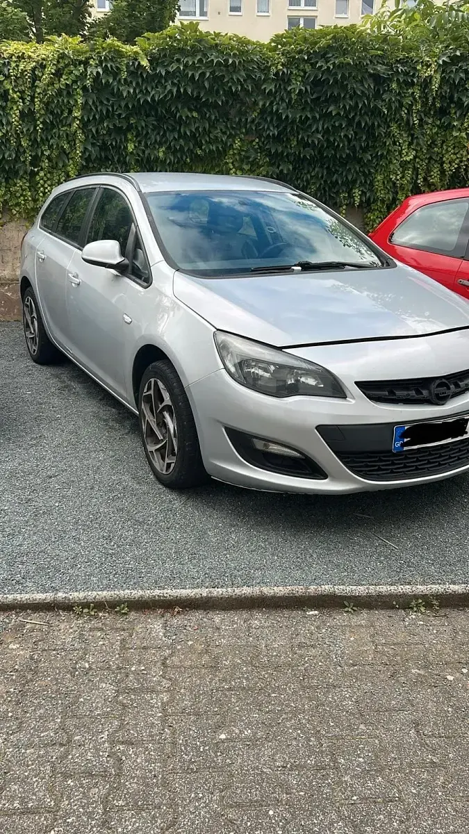 Gebraucht Opel Astra 110 PS (80 kW) 2015 Silber Kleinwagen