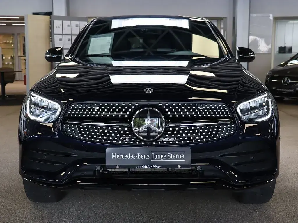 Gebraucht Mercedes GLC300de AMG 194 PS (142 kW) 2023 Cavansitblau metallic Coupé