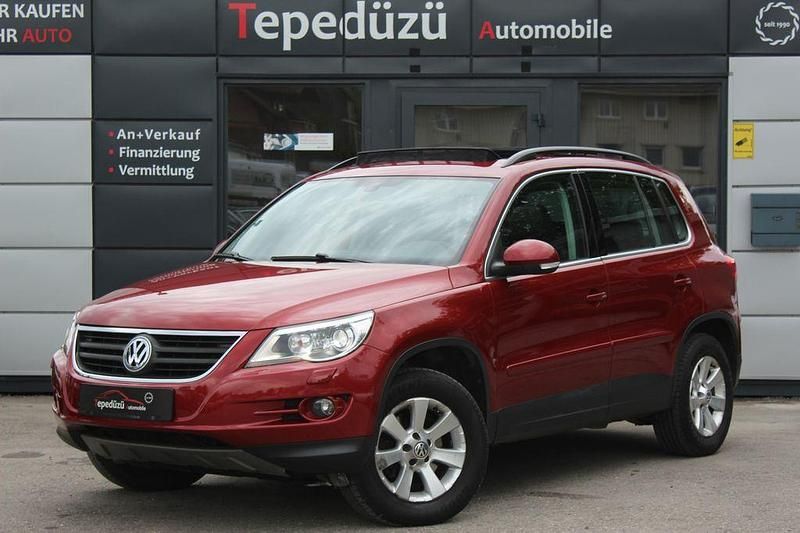 Rot Gebraucht 2008 VW Tiguan Track & Field SUV | 9.499 € (Fairer Preis) - Bild 1/4