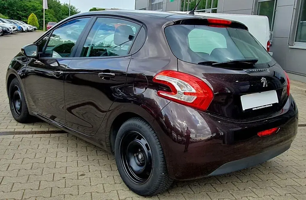 Gebraucht Peugeot 208 Active 82 PS (60 kW) 2013 Schwarz Kleinwagen