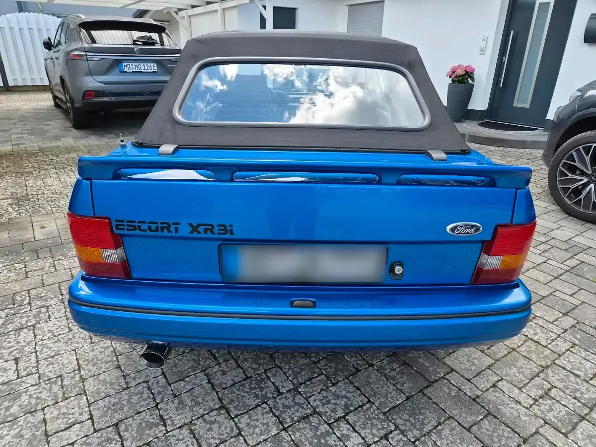 Gebraucht Ford Escort Cabriolet 102 PS (75 kW) 1990 Blau Cabrio