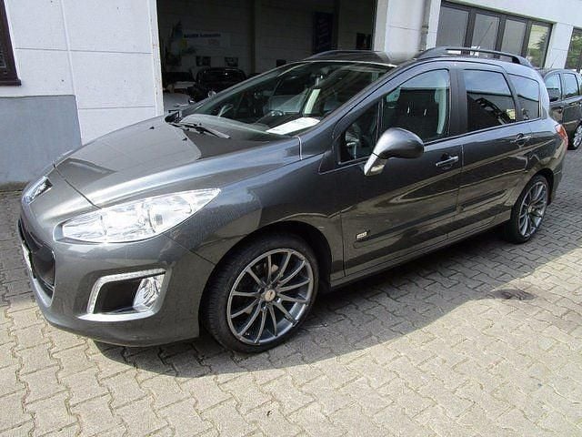 Gebraucht Peugeot 308 SW Style 114 PS (83 kW) 2014 Andere farbe metallic Kombi