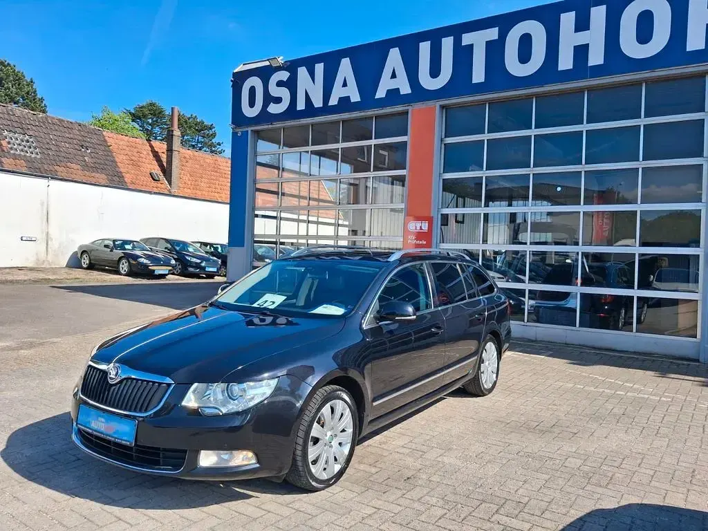 Używany Skoda Superb Elegance 170 KM (125 kW) 2012 Czarny Kombi