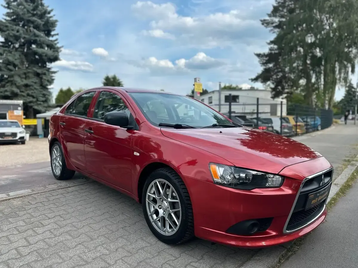 Gebraucht Mitsubishi Lancer 117 PS (86 kW) 2015 Rot Limousine
