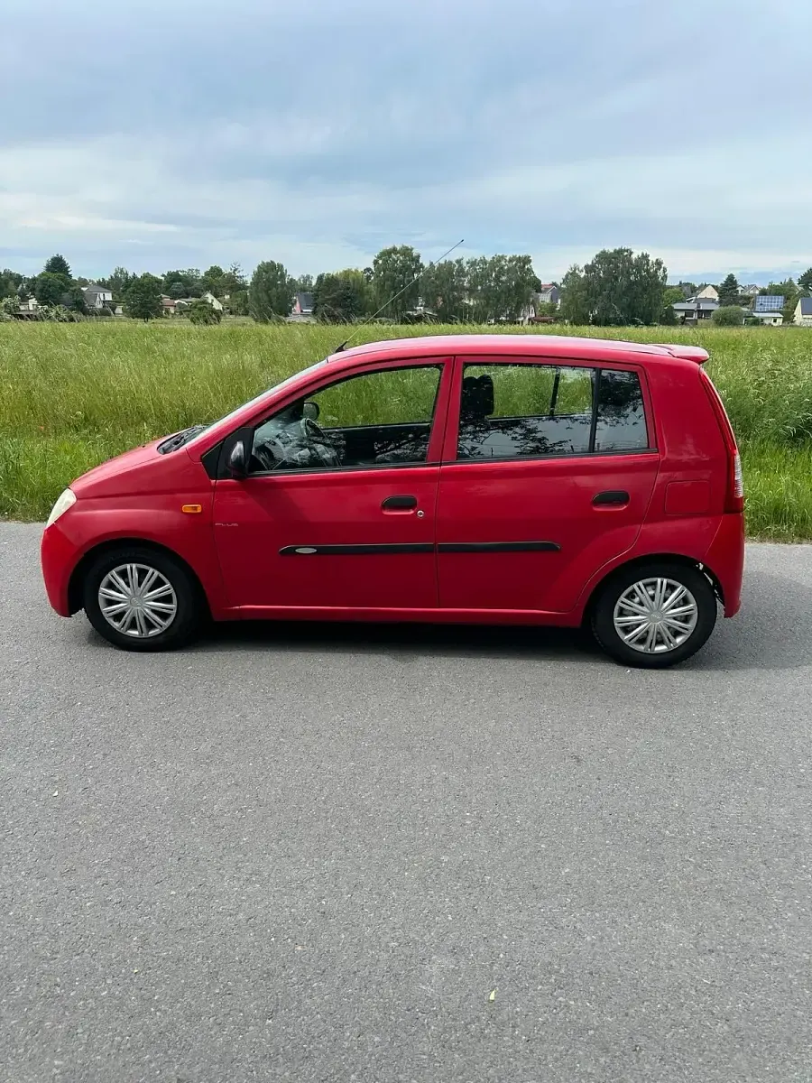 Gebraucht Daihatsu Cuore 60 PS (44 kW) 2004 Rot Kleinwagen