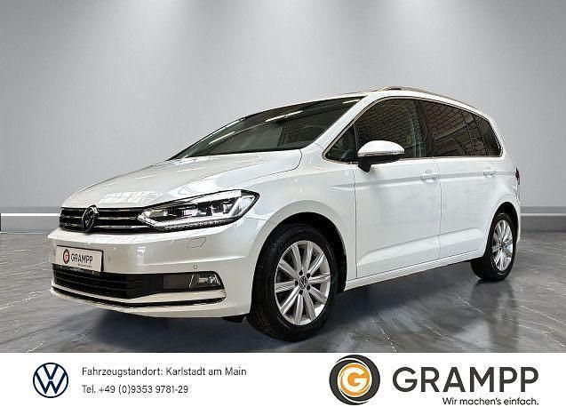 Oryxweiß perlmutteffekt Gebraucht 2024 VW Touran Highline Van / Kleinbus | 33.790 € (Fairer Preis) - Bild 1/4